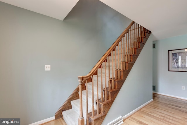 5855 Springmount Ct, Eldersburg, MD 21784 - stairs with visible vents, baseboards, and wood finished floors