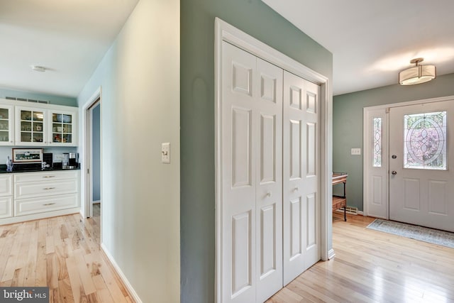 5855 Springmount Ct, Eldersburg, MD 21784 - foyer featuring light wood-style flooring and baseboards