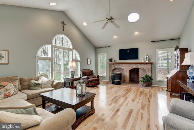 5855 Springmount Ct, Eldersburg, MD 21784 - living room featuring wood finished floors, a wealth of natural light, ceiling fan, and high vaulted ceiling