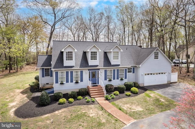 5855 Springmount Ct, Eldersburg, MD 21784 - cape cod house featuring an attached garage, driveway, a shingled roof, and a front lawn