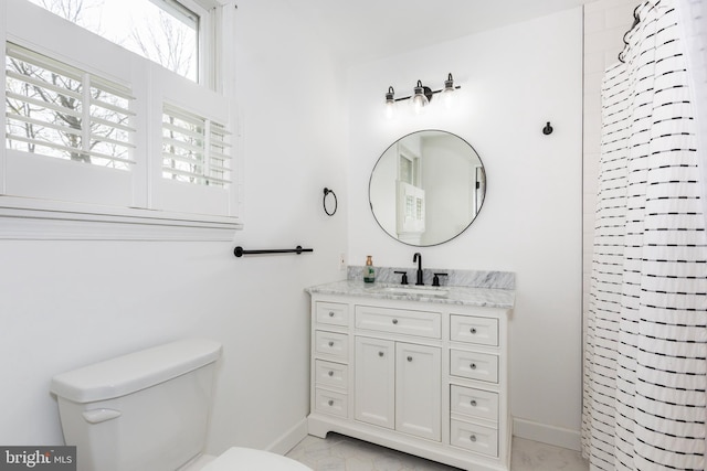 5855 Springmount Ct, Eldersburg, MD 21784 - bathroom featuring toilet, baseboards, marble finish floor, curtained shower, and vanity