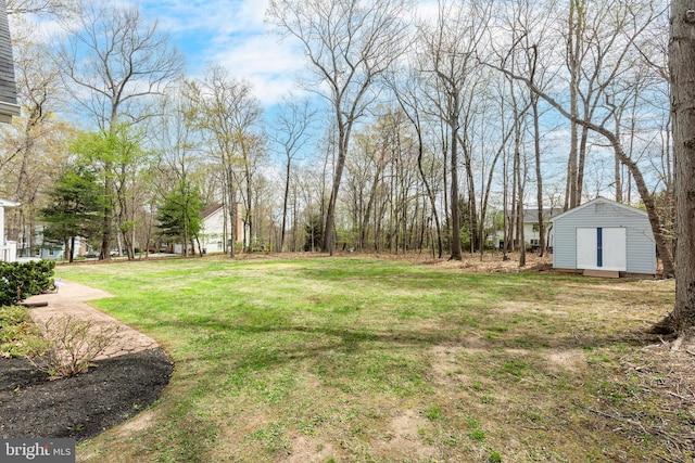 5855 Springmount Ct, Eldersburg, MD 21784 - view of yard featuring an outdoor structure and a shed