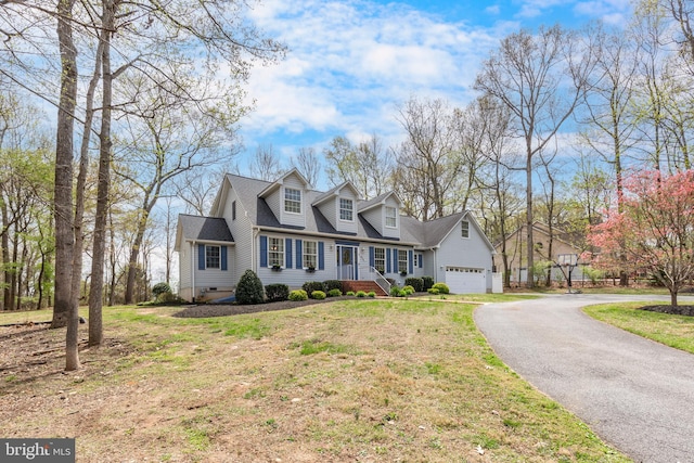 5855 Springmount Ct, Eldersburg, MD 21784 - cape cod home with a garage, driveway, crawl space, and a front lawn
