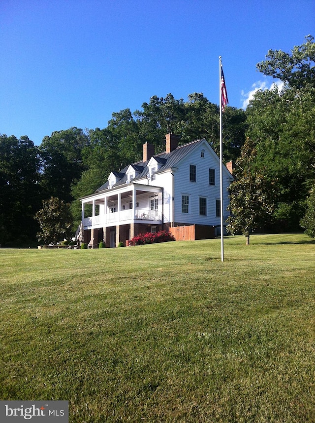 7295 Dudie Rd, Marshall, VA 20115 - rear view of property with a chimney, a lawn, and view of scattered trees