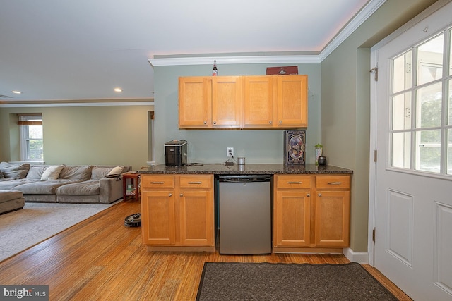 kitchen with recessed lighting, dishwasher, light wood finished floors, dark stone countertops, and crown molding
