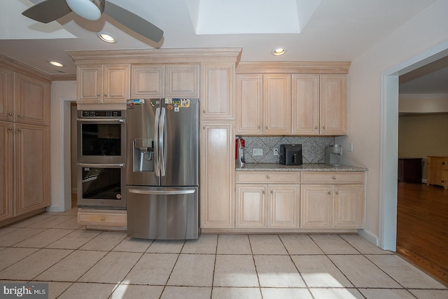 kitchen featuring appliances with stainless steel finishes, light tile patterned floors, ceiling fan, and recessed lighting