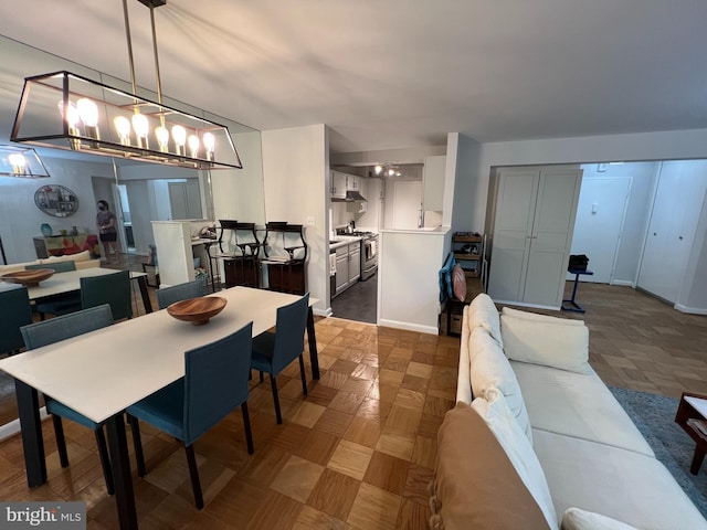 dining space with baseboards