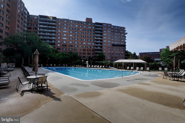pool featuring a patio