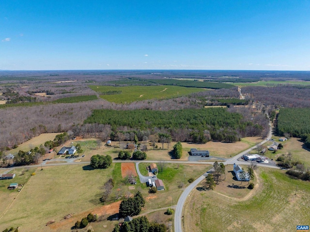 birds eye view of property with a rural view