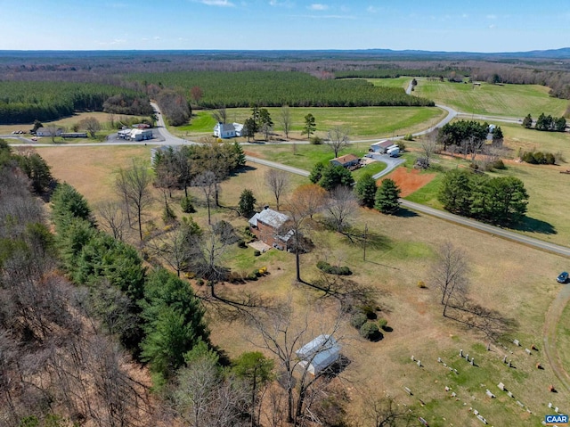 birds eye view of property with a rural view
