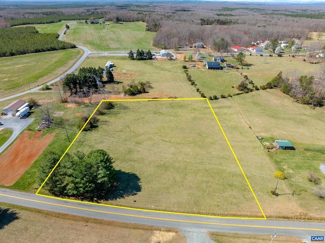 birds eye view of property featuring a rural view