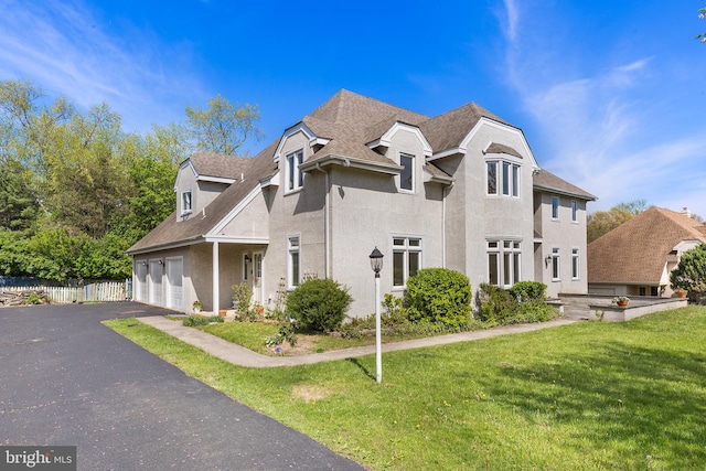 1406 Gentlemens Way, Dresher, PA 19025 - view of front of property featuring a garage, asphalt driveway, roof with shingles, and stucco siding