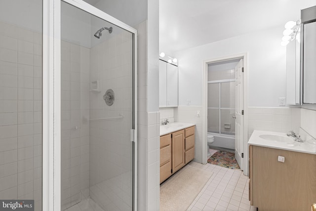 1406 Gentlemens Way, Dresher, PA 19025 - bathroom with vanity, tile walls, tile patterned floors, and wainscoting