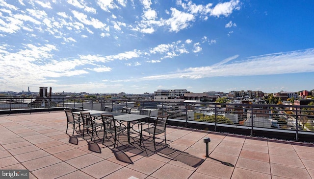 view of patio with a city view