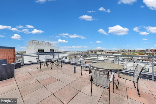 view of patio / terrace with a city view