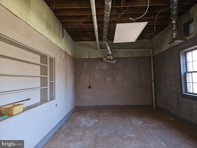 basement featuring baseboards
