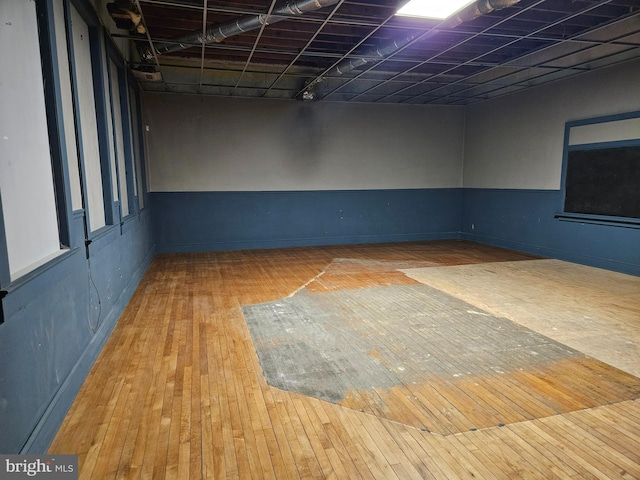 empty room featuring hardwood / wood-style flooring