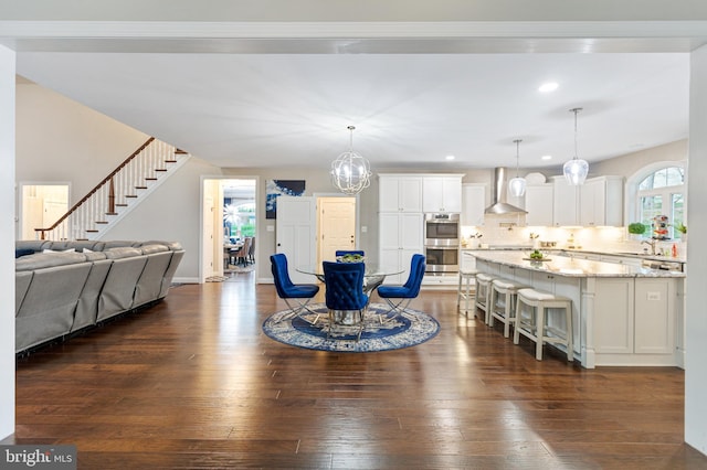 765 Blueberry Ct, Huntingtown, MD 20639 - living room with dark wood-style flooring, baseboards, stairway, and recessed lighting