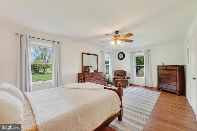bedroom featuring ceiling fan and light wood finished floors
