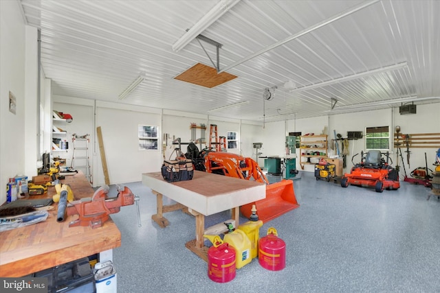 garage with a workshop area