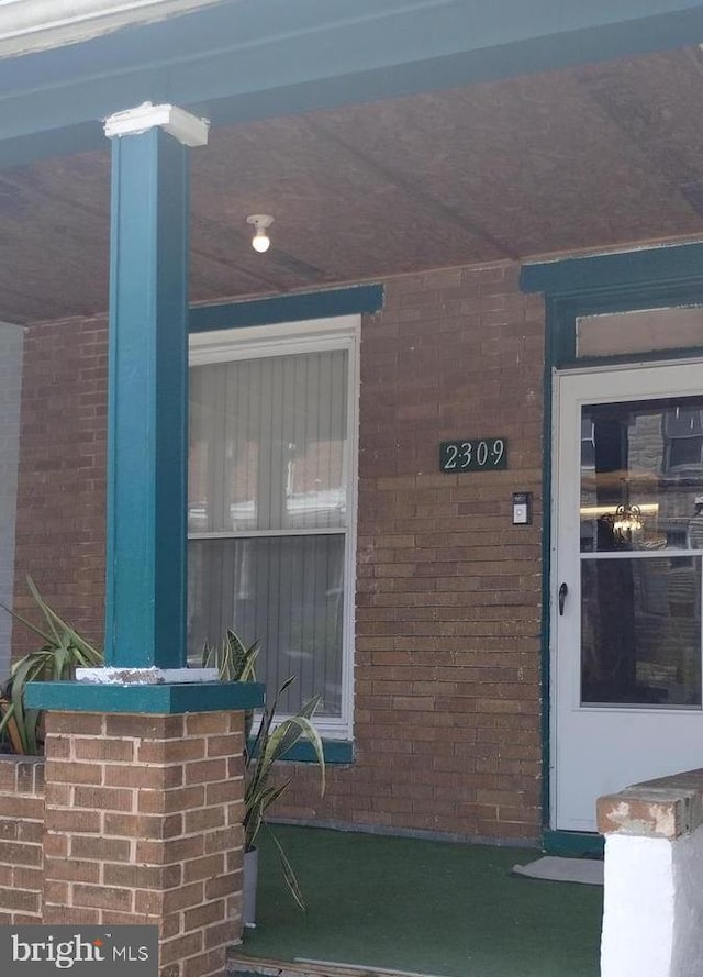 2309 Lauretta Ave, Baltimore, MD 21223 - property entrance with brick siding