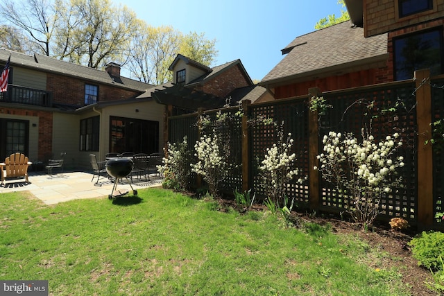 451 E Hamilton Ave, State College, PA 16801 - view of yard with a patio and fence