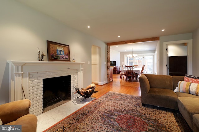 451 E Hamilton Ave, State College, PA 16801 - living area with recessed lighting, a fireplace, light wood finished floors, and a chandelier