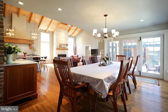 451 E Hamilton Ave, State College, PA 16801 - dining area featuring light wood-type flooring, a chandelier, wooden ceiling, and beamed ceiling