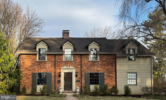 451 E Hamilton Ave, State College, PA 16801 - view of front facade with roof with shingles, a chimney, and brick siding