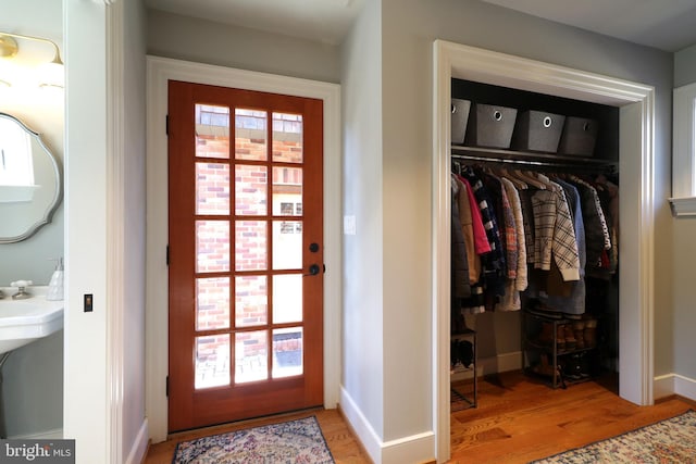 451 E Hamilton Ave, State College, PA 16801 - doorway with baseboards and wood finished floors