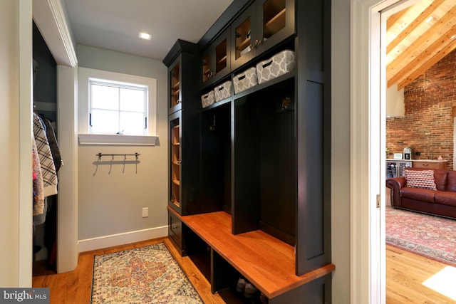 451 E Hamilton Ave, State College, PA 16801 - mudroom with light wood-style floors, baseboards, and brick wall