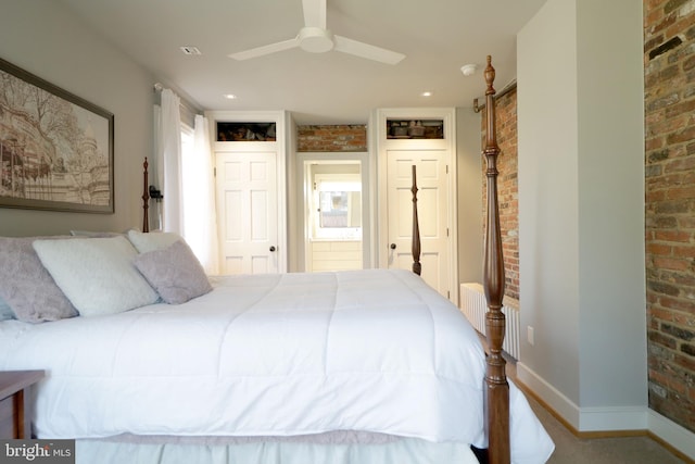 451 E Hamilton Ave, State College, PA 16801 - bedroom with connected bathroom, brick wall, ceiling fan, and baseboards