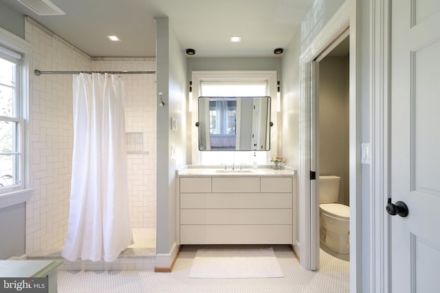 451 E Hamilton Ave, State College, PA 16801 - bathroom with vanity, a stall shower, toilet, and visible vents