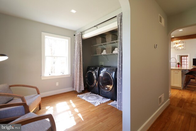 451 E Hamilton Ave, State College, PA 16801 - laundry room with laundry area, arched walkways, separate washer and dryer, and visible vents