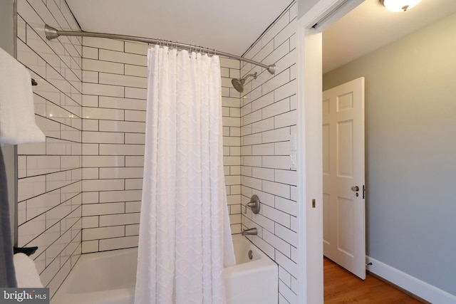 451 E Hamilton Ave, State College, PA 16801 - full bathroom featuring baseboards, wood finished floors, and shower / tub combo