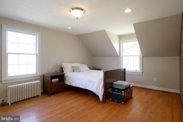 451 E Hamilton Ave, State College, PA 16801 - bedroom featuring radiator, baseboards, recessed lighting, light wood finished floors, and vaulted ceiling