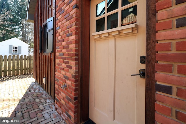 451 E Hamilton Ave, State College, PA 16801 - view of exterior entry with brick siding and fence