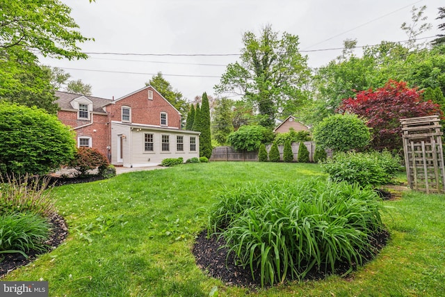 view of yard with fence