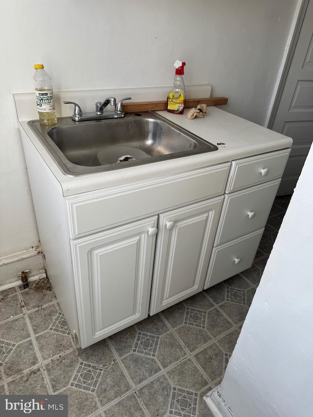 1725 N Creighton St, Philadelphia, PA 19131 - interior space featuring a sink, white cabinetry, and light countertops