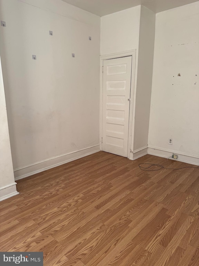 1725 N Creighton St, Philadelphia, PA 19131 - empty room with baseboards and light wood finished floors