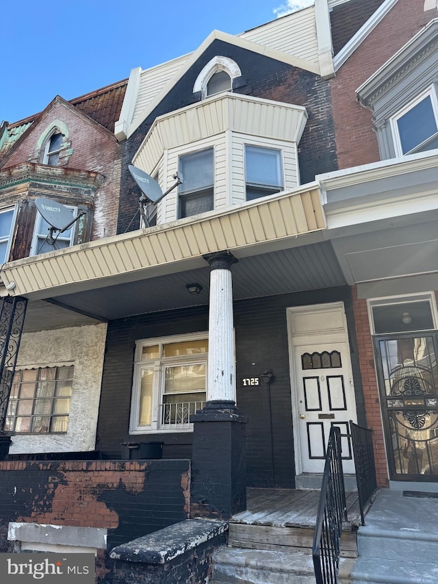 1725 N Creighton St, Philadelphia, PA 19131 - exterior space featuring covered porch and brick siding