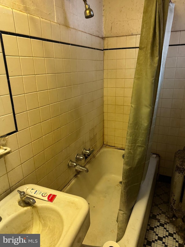 1725 N Creighton St, Philadelphia, PA 19131 - bathroom with tile walls, shower / tub combo with curtain, and a sink