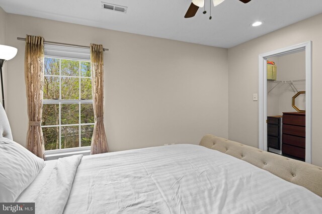 bedroom featuring visible vents, ceiling fan, a spacious closet, and recessed lighting