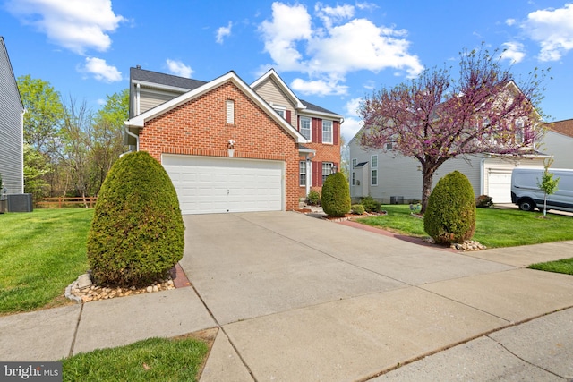 traditional home featuring brick siding, a garage, driveway, central AC, and a front yard