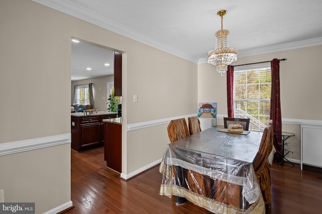 dining room featuring baseboards, an inviting chandelier, dark wood-style flooring, and crown molding