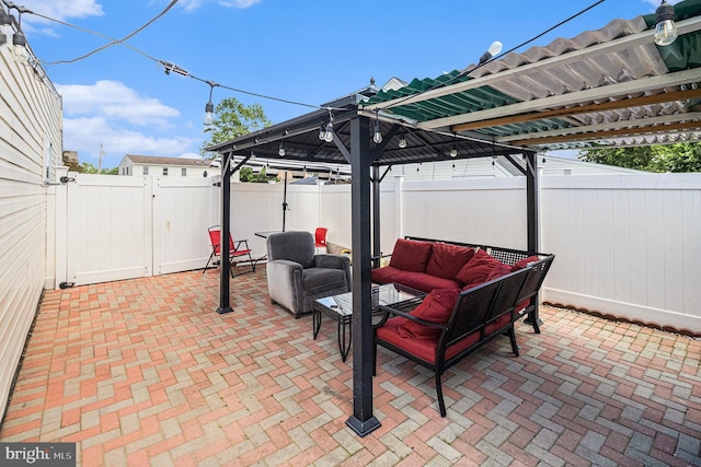 59 Granite Rd, Levittown, PA 19057 - fenced backyard featuring a gazebo, outdoor lounge area, a patio area, and a gate
