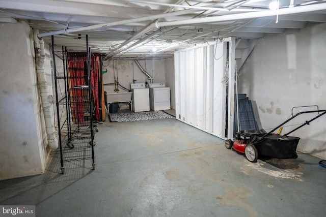 8 Oakley Rd, Upper Darby, PA 19082 - below grade area with washing machine and clothes dryer and a sink