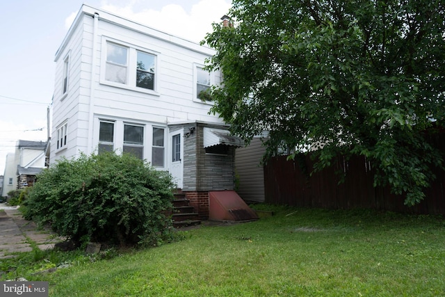 8 Oakley Rd, Upper Darby, PA 19082 - rear view of property featuring a yard and entry steps