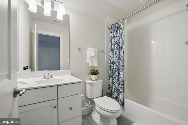 122 Boxelder Dr, Stafford, VA 22554 - full bathroom featuring toilet, vanity, shower / bath combo with shower curtain, and tile patterned floors