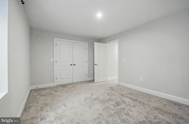 122 Boxelder Dr, Stafford, VA 22554 - unfurnished bedroom with carpet floors, baseboards, and a closet